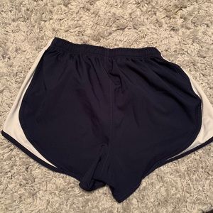 Navy blue and white athletic shorts